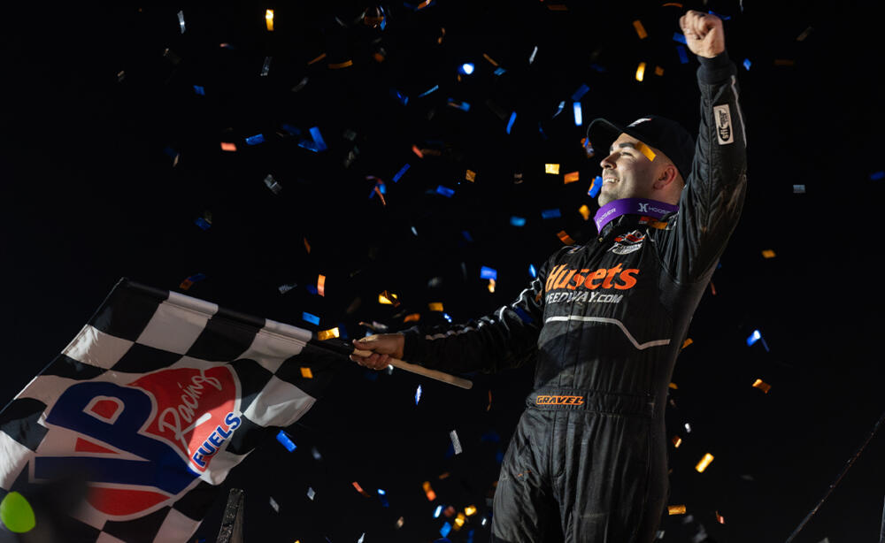 David Gravel celebrates with a wing dance at Weedsport Speedway