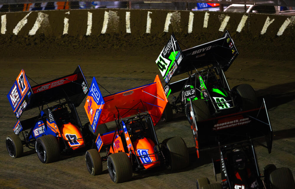 Sheldon Haudenschild, Carson Macedo, Gio Scelzi, and Sam Hafertepe Jr. line up for the start of a race