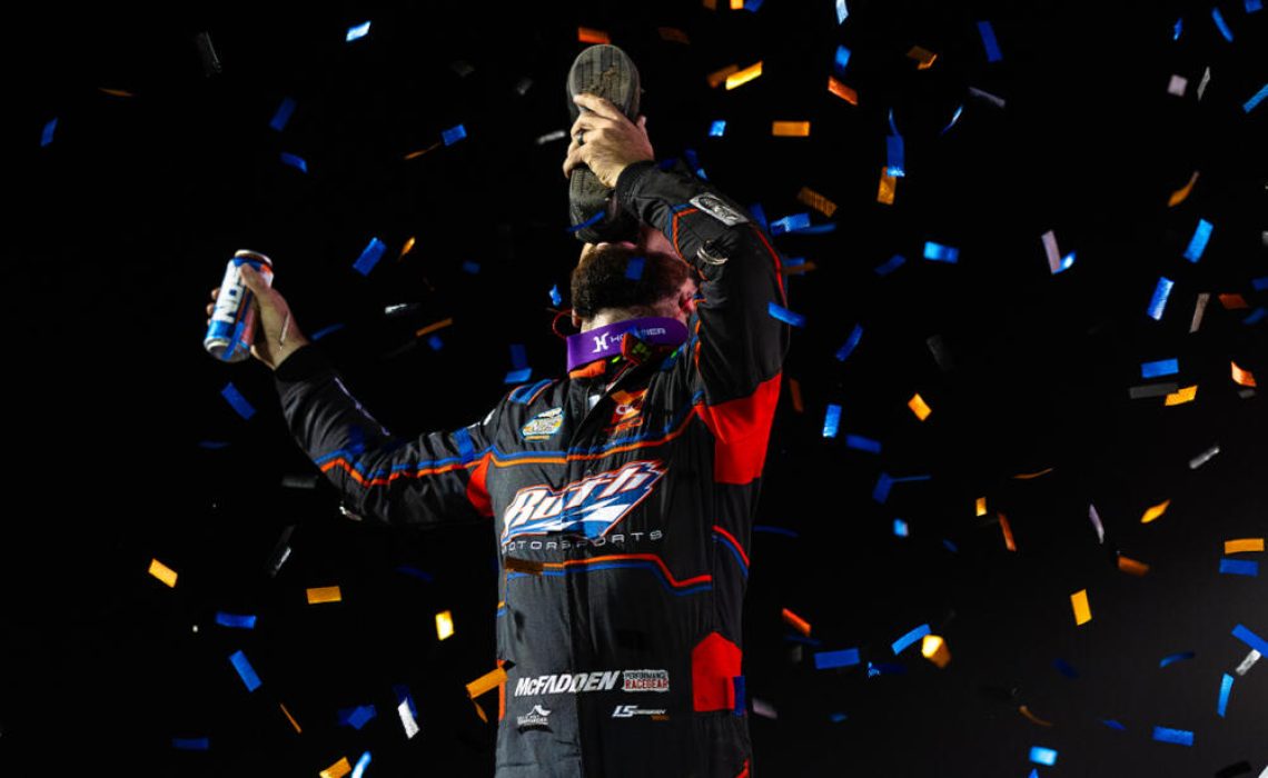 James McFadden Celebrates his win with a Shoey atop the wing