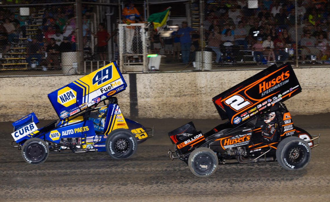 Brad Sweet races in front of David Gravel